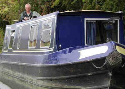 College Cruisers' canal boat Hertford, painted in Oxford Blue, on the Oxford Canal.