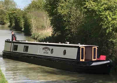 Doesn't look like a rental boat! College Cruisers' newest narrowboat on the Oxford Canal angled so that the name can be seen.